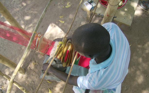 Man weaving kente in Eastern Region, Ghana