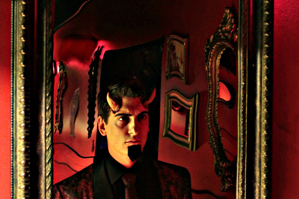 Elliott James' Satan looks into a mirror, darkly