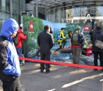 Models show off high-tech camping and climbing gear.