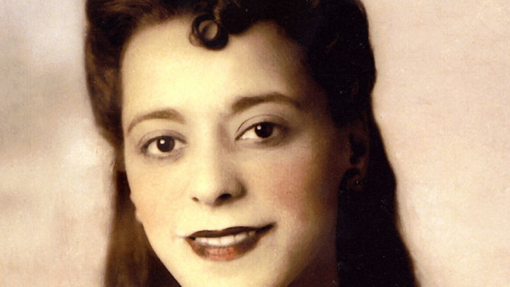 Viola Desmond smiles at the camera